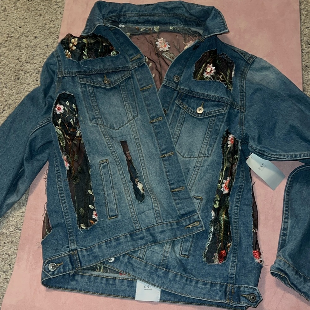 Jean jacket with embroidered flowers on mesh